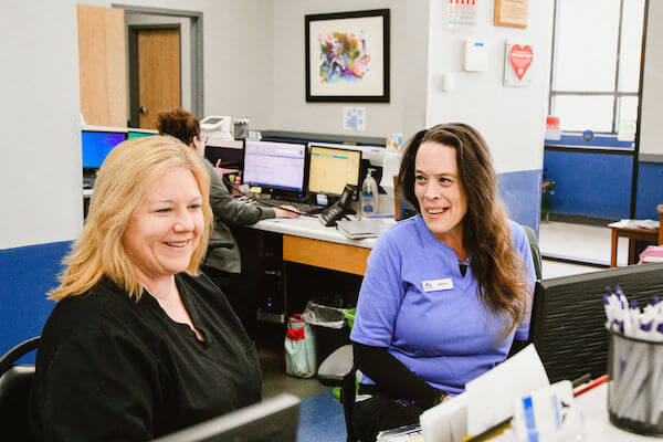 Indian Trail Animal Hospital Reception Team Smiling